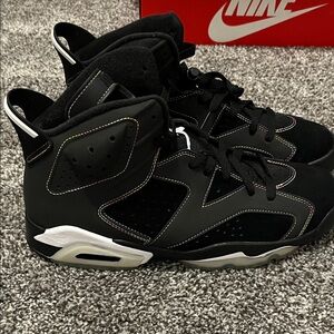 Nike men’s Black and White High-Top Sneakers